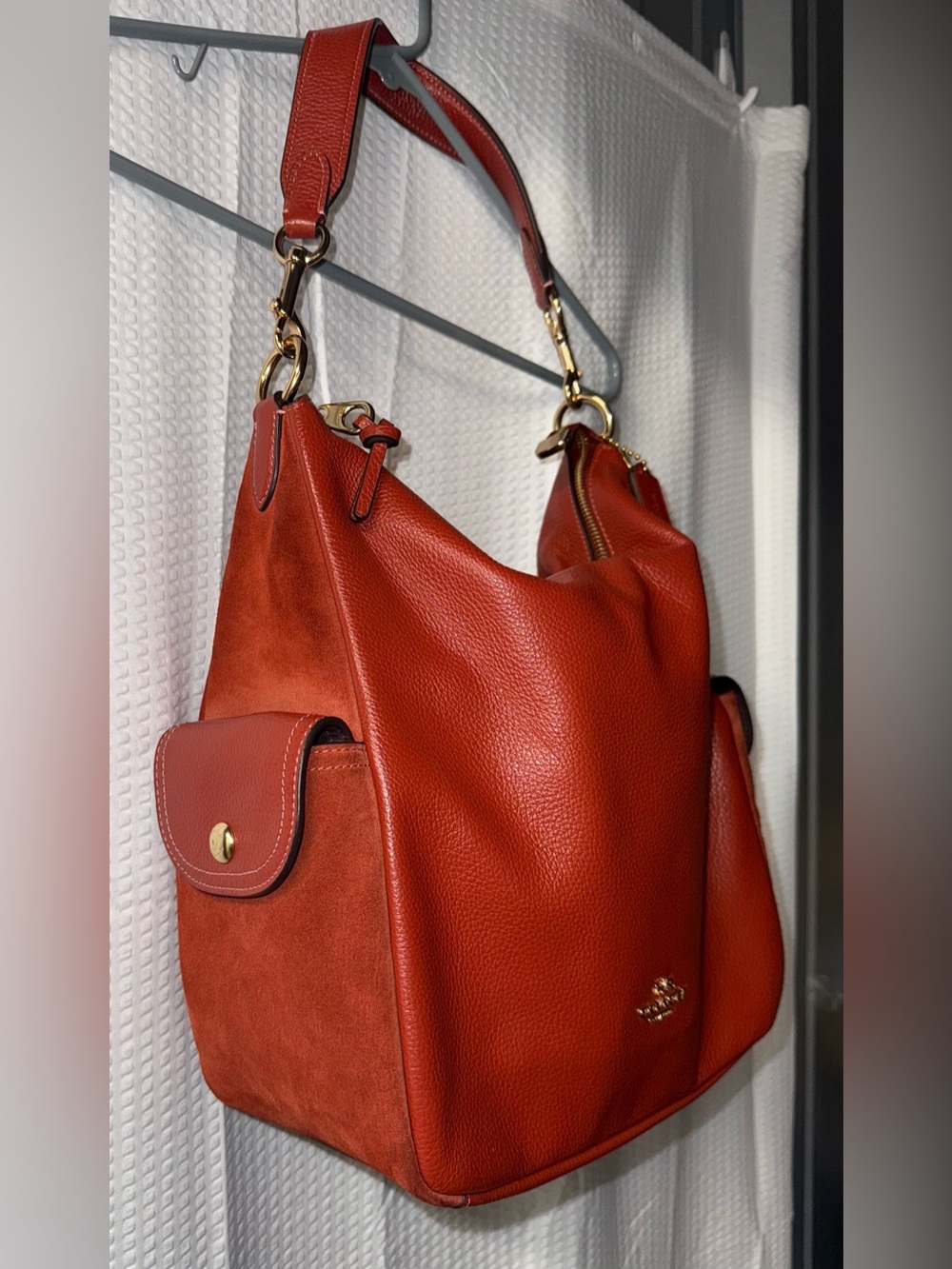 Coach Pennie Shoulder Bag features gold hardware and side suede pockets - Picture 4 of 15